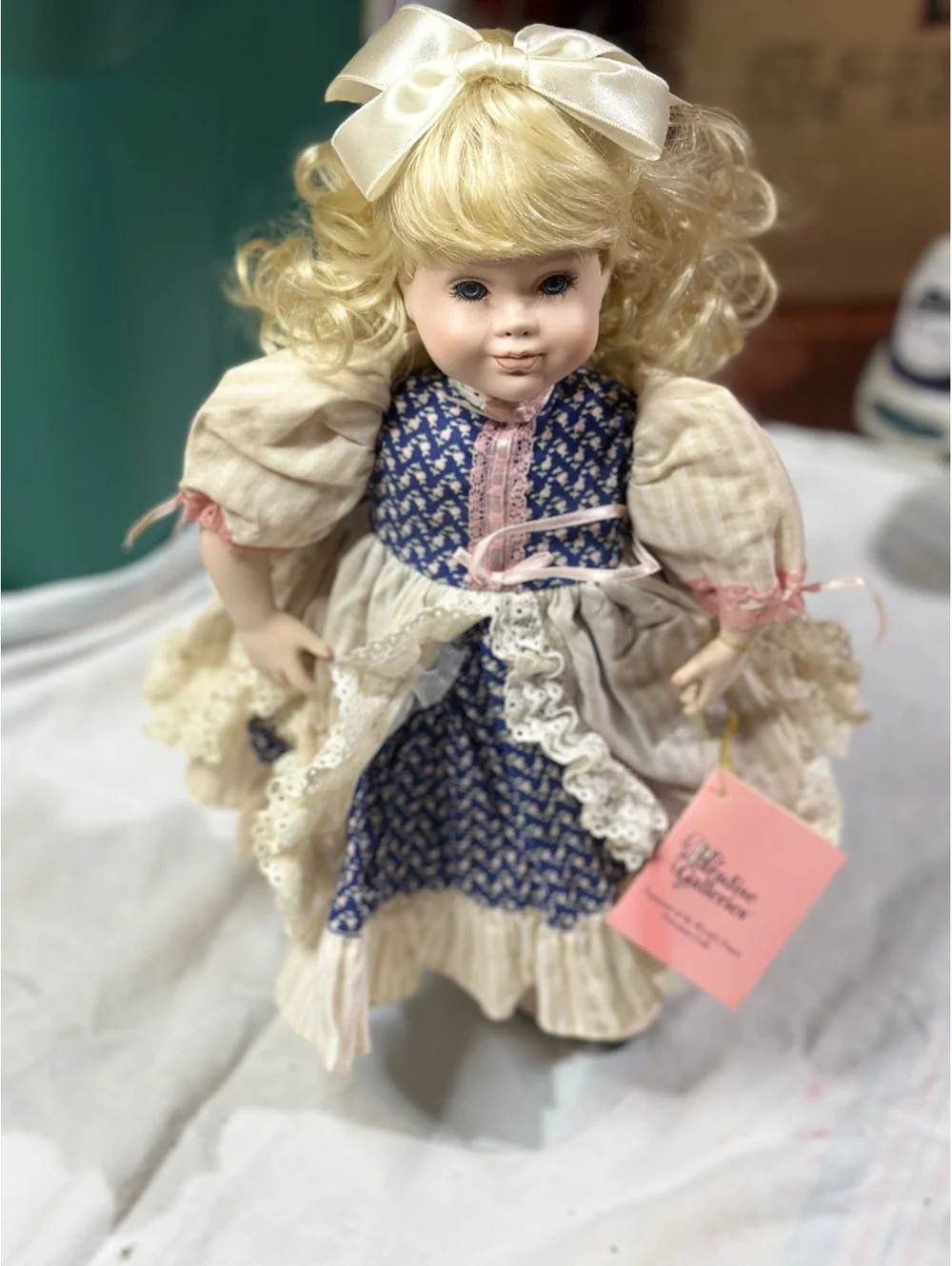 1992 Paradise Galleries Porcelain Doll with Blonde Hair and Blue Dress